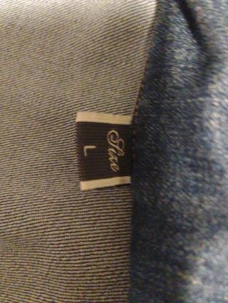 Chaqueta tejana desgastada