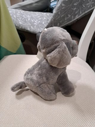 Peluche perro gris con sonido