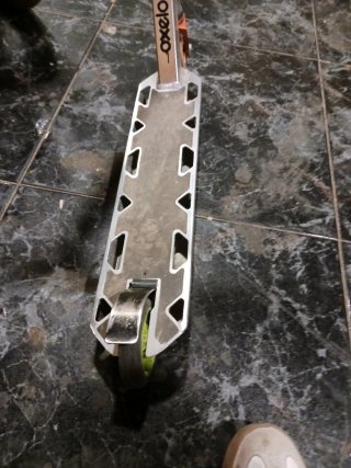 Patinete freestyle plateado