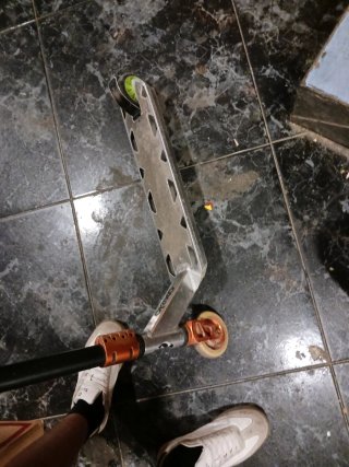 Patinete freestyle plateado