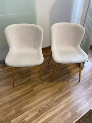 Juego de 2 sillas blancas con patas doradas