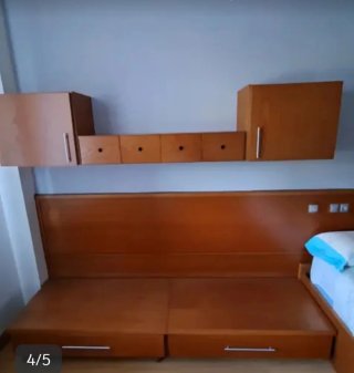 Armario de madera con mesita y cajones, etc...