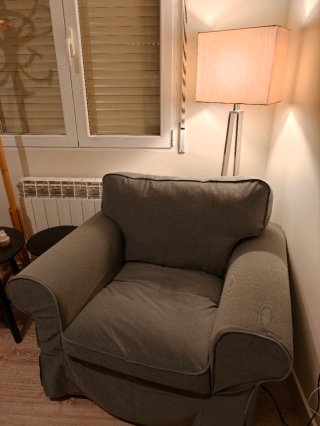 Sillón de tela verde
