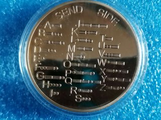 Moneda con Código Morse