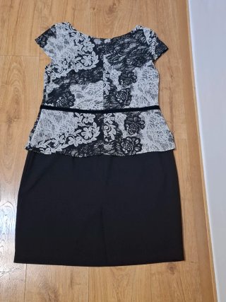 Vestido efecto busa volante y falda. Talla 48