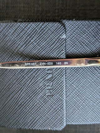 Occhiali da sole Prada azzurri e oro