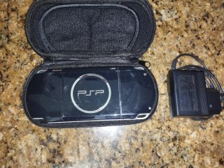 PSP 3004 Negra con Cargador y Funda