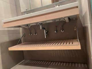 Mueble de baño doble con grifos