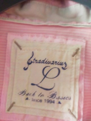 Blusa Stradivarius manga corta fruncida rosa