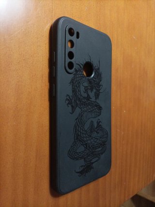 Funda móvil negra con dragón