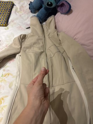 Mono de esquí beige y blanco