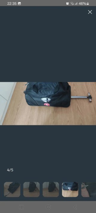 Maleta de viaje negra con ruedas