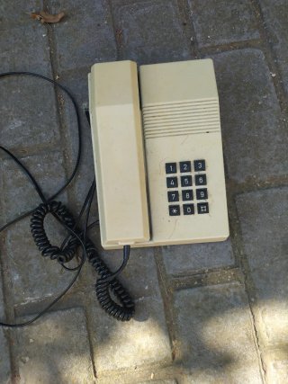 Teléfono fijo clásico beige