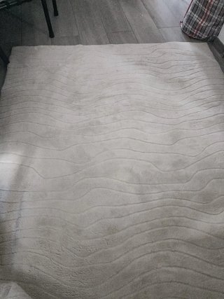Alfombra beige y gris casi nueva