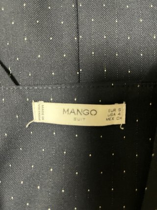 Abito azzurro a pois per l'ufficio