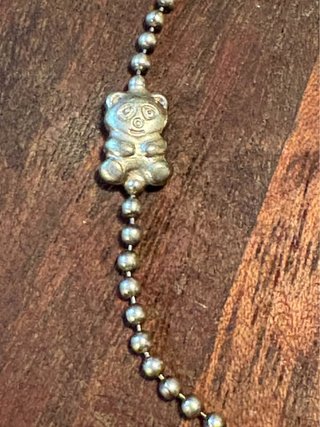Bracciale palline con panda in argento