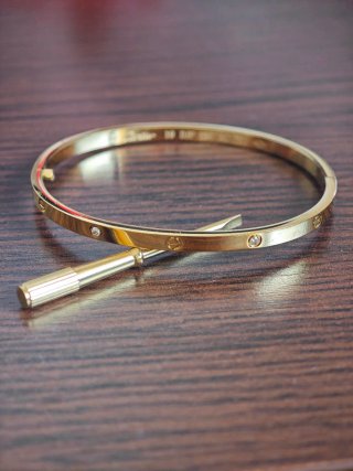Pulsera Cartier Oro con Tornillos y Diamantes