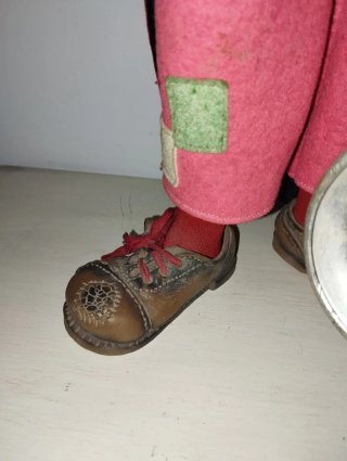 Muñeco antiguo payaso con saxofón
