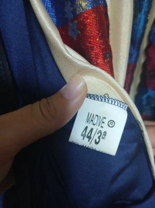 Traje de teatro azul y dorado