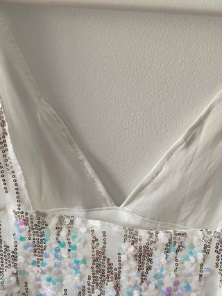 Top blanco lentejuelas
