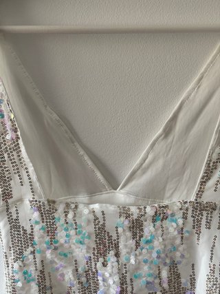 Top blanco lentejuelas