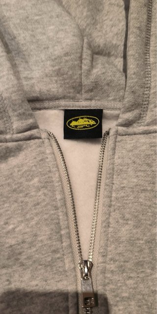 Sudadera Corteiz con cremallera gris