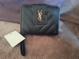 Cartera de mano con logo YSL