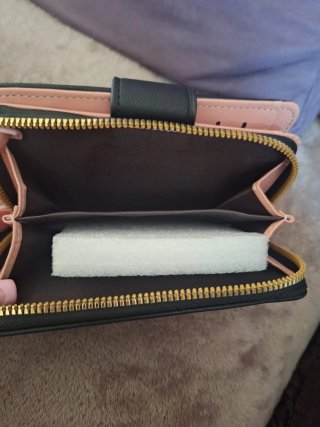 Cartera de mano con logo YSL