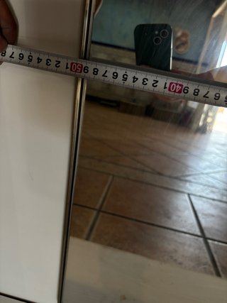 Specchio moderno in metallo e vetro