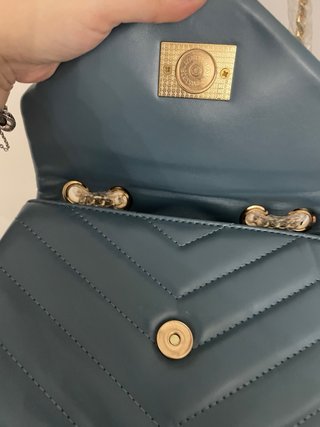 Bolso azul con estrella y flecos