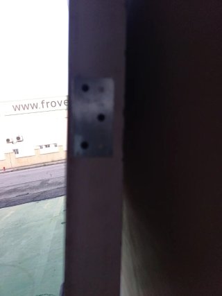 Puerta contrafuegos con picaporte