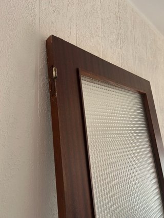 Puerta de madera con cristal