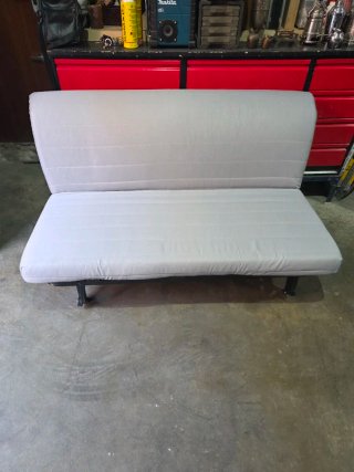 Sofá cama gris tela y metal