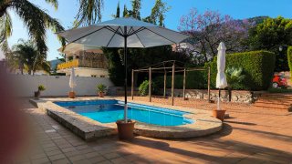 Sombrilla de jardín con base de terracota