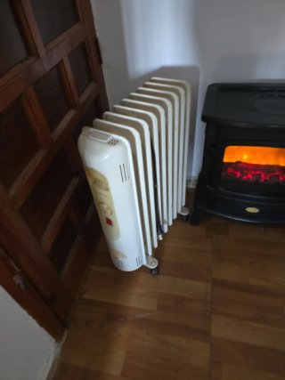Estufa eléctrica y radiador