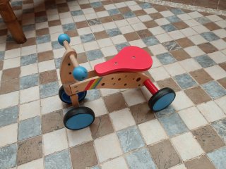 Triciclo de madera para niños
