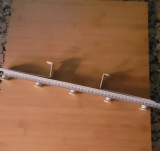 Perchero de puerta blanco. Acero