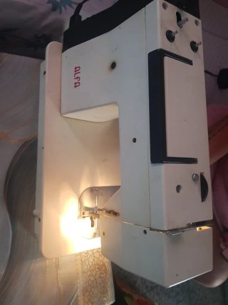 Máquina de coser Alfa