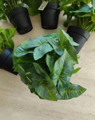 Planta artificial con maceta