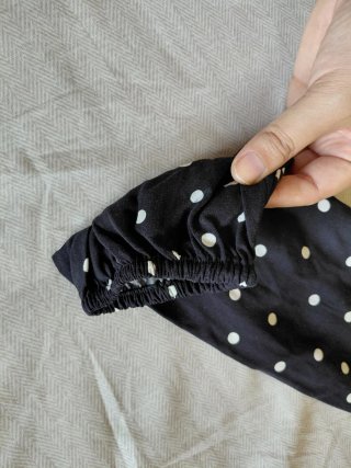 Camisa de lunares negra y blanca