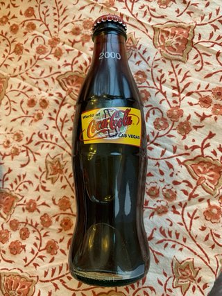 Set di sette bottiglie da collezione Coca-Cola
