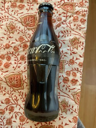 Set di sette bottiglie da collezione Coca-Cola