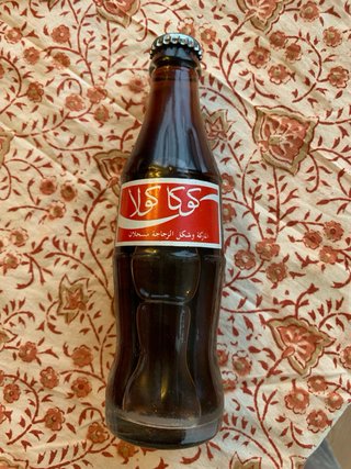 Set di sette bottiglie da collezione Coca-Cola