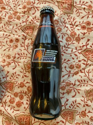 Set di sette bottiglie da collezione Coca-Cola