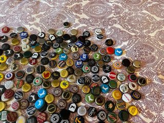 Lottazione di tappi di bevande varie