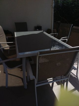 Mesa y 6 sillones de jardín