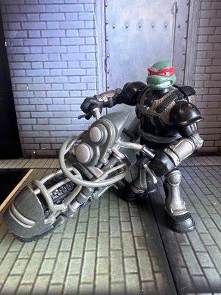 Figura TMNT Raphael en Moto