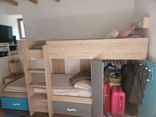 Cama nido juvenil con armario y cajones