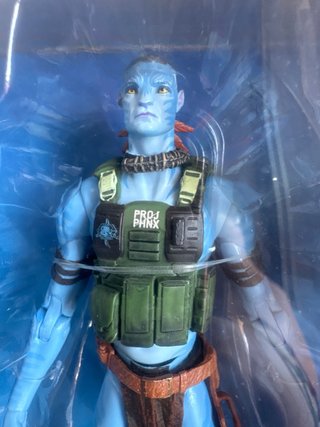 Figura McFarlane Avatar Quaritch Ash Recom