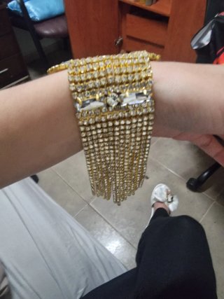 Pulsera de pedrería dorada y plateada